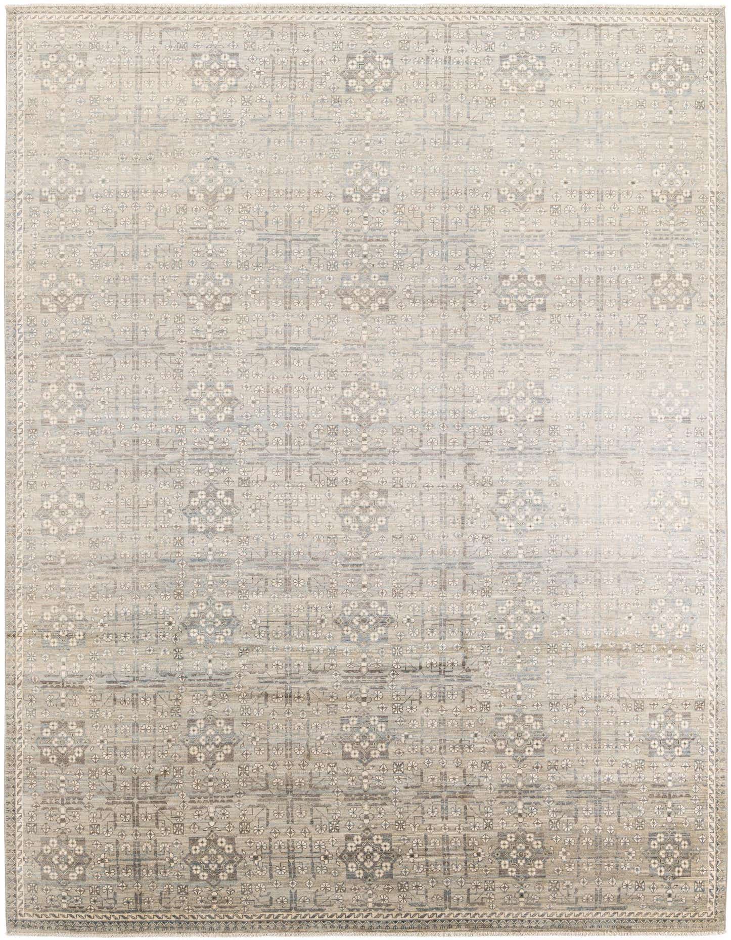A rectangular 8x12 gray and silver hand-spun wool rug with a modern oriental pattern, featuring subtle geometric motifs.