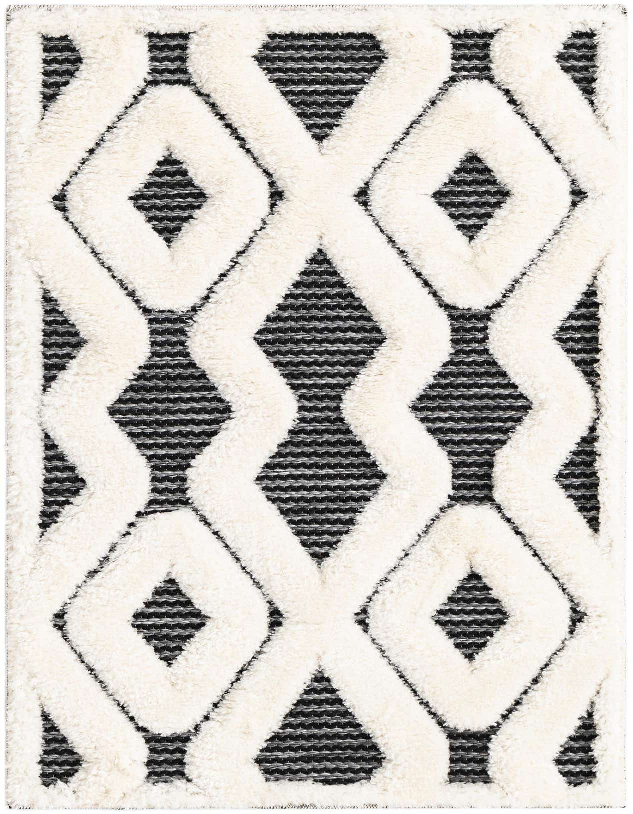 A 2x3 rectangular rug featuring a bold geometric pattern of raised ivory diamonds on a flatweave gray background.