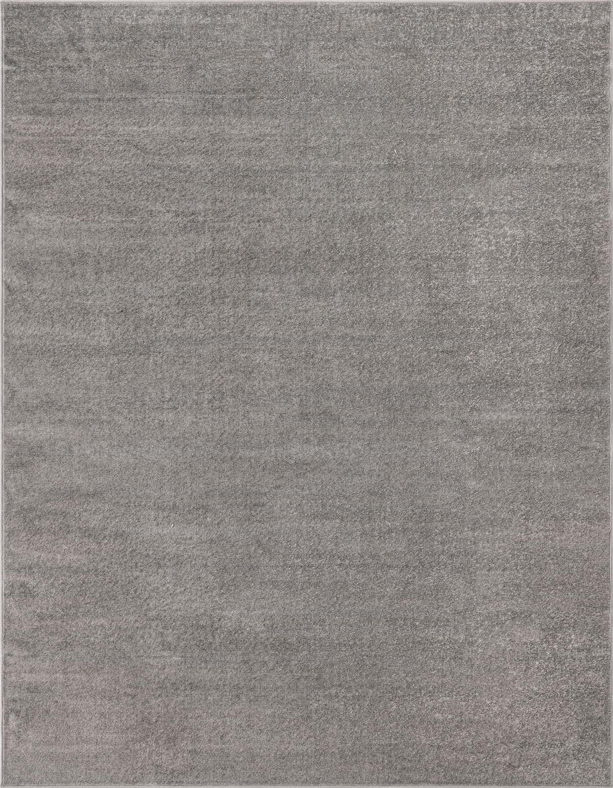 A 5x8 rectangular gray area rug with a subtle, solid urban texture, suitable for a modern living space.