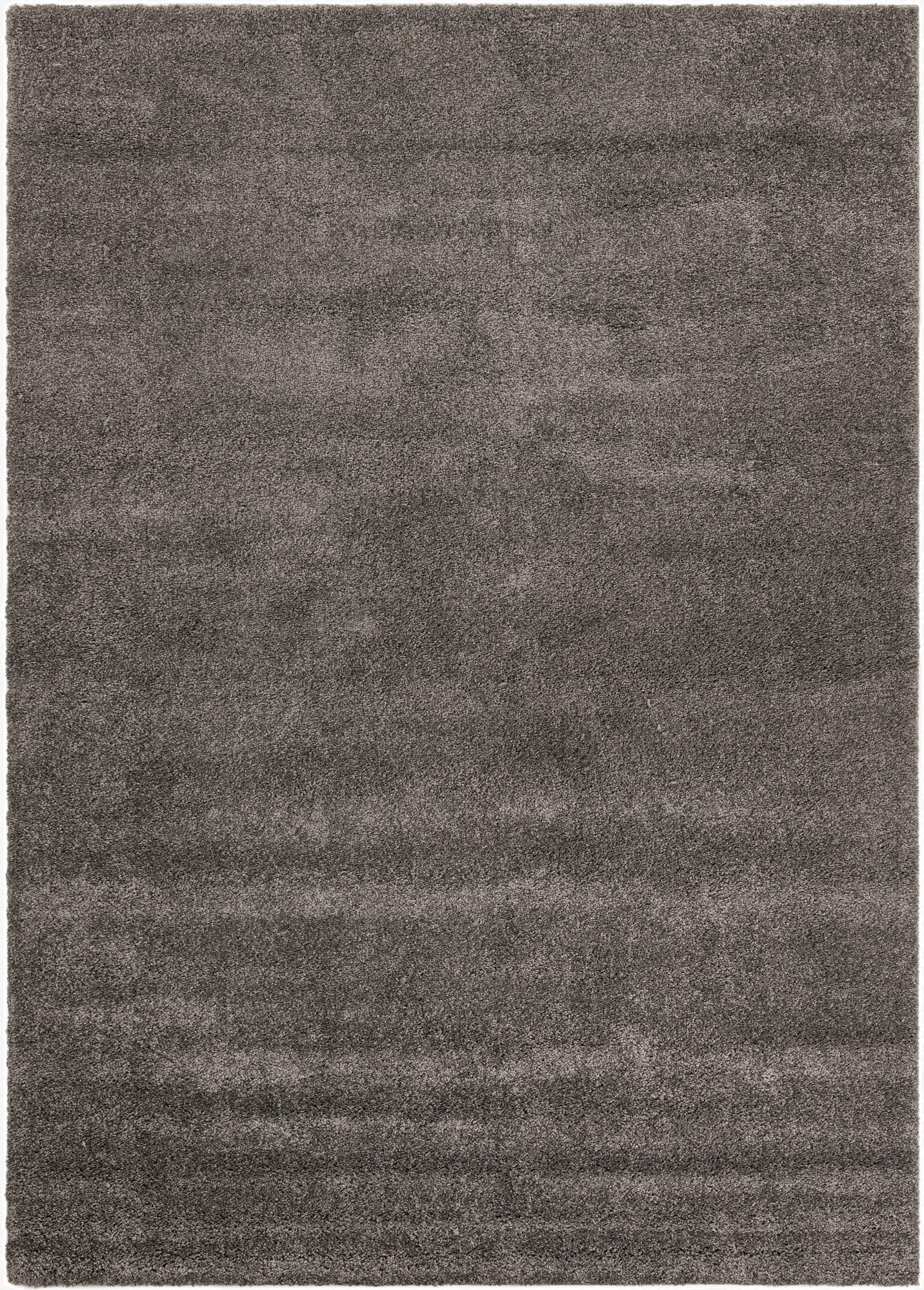 A large 8x11 rectangular gray area rug with a textured, plush frieze pile, perfect for a modern living room.