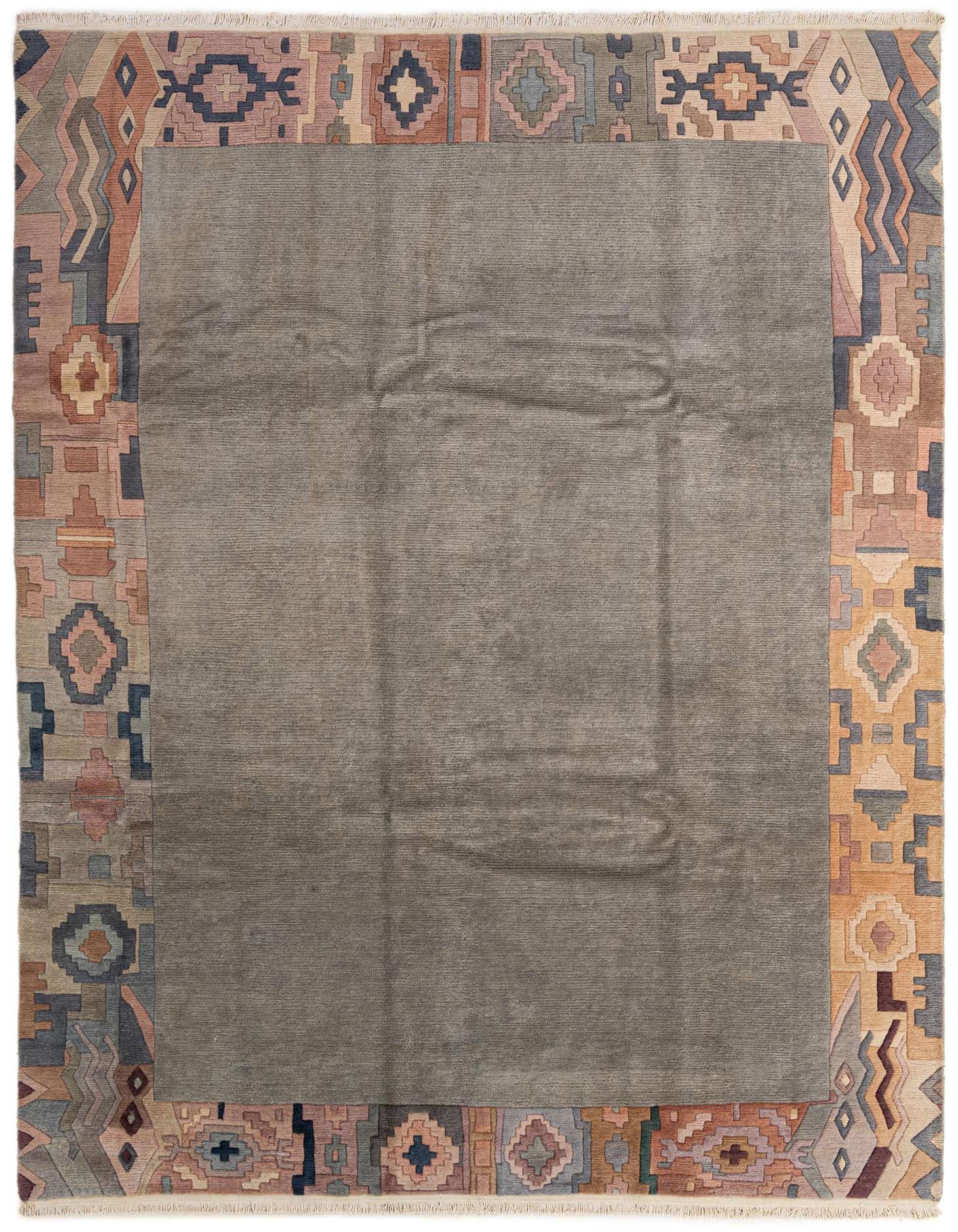 8x11 rectangular gray wool rug with a wide border featuring modern geometric and Oriental patterns in muted blues, pinks, oranges, and grays.