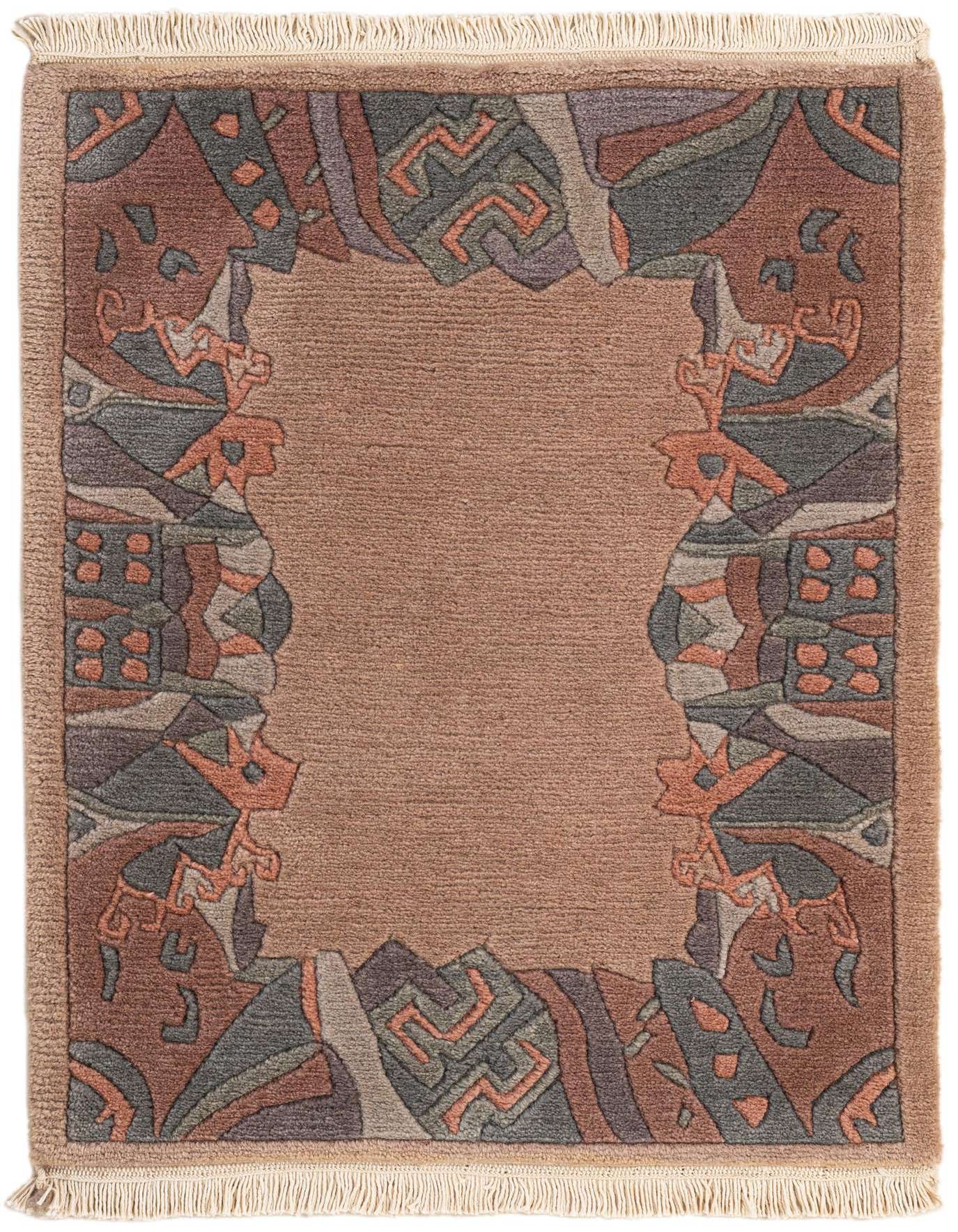 A 2x3 rectangular gray wool rug with a modern abstract border in shades of gray, brown, and peach, featuring fringe.