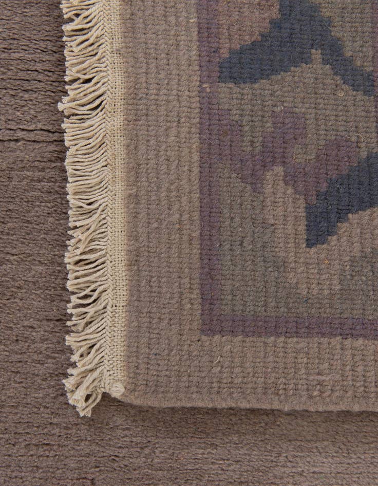 Detail image of  4' 3 x 6' 2  Hand Knotted Tibet Wool Rug