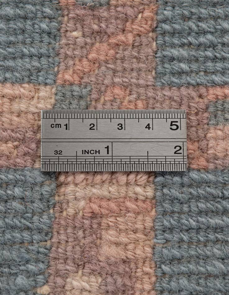 Detail image of  4' 2 x 5' 10  Hand Knotted Tibet Wool Rug