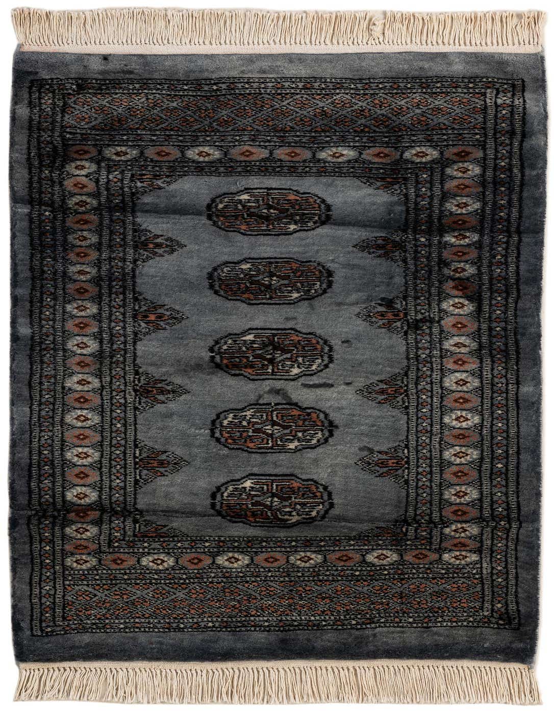 A 3x4 rectangular gray wool rug with a traditional Oriental pattern and fringe, ideal for indoor spaces.