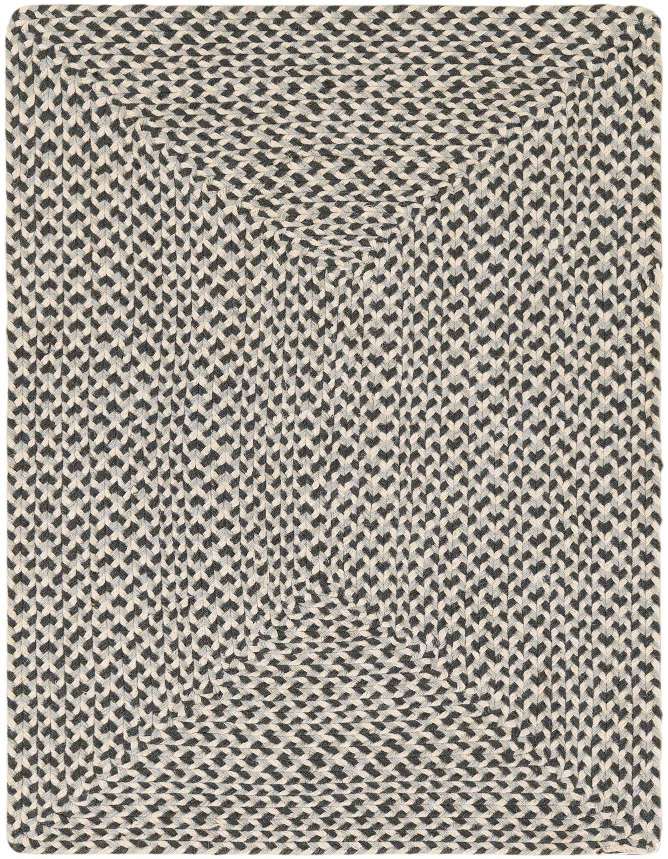 A 2x3 rectangular Rugs.com Tweed Braided Jute rug in varying shades of gray, featuring a tight, textured braided pattern.