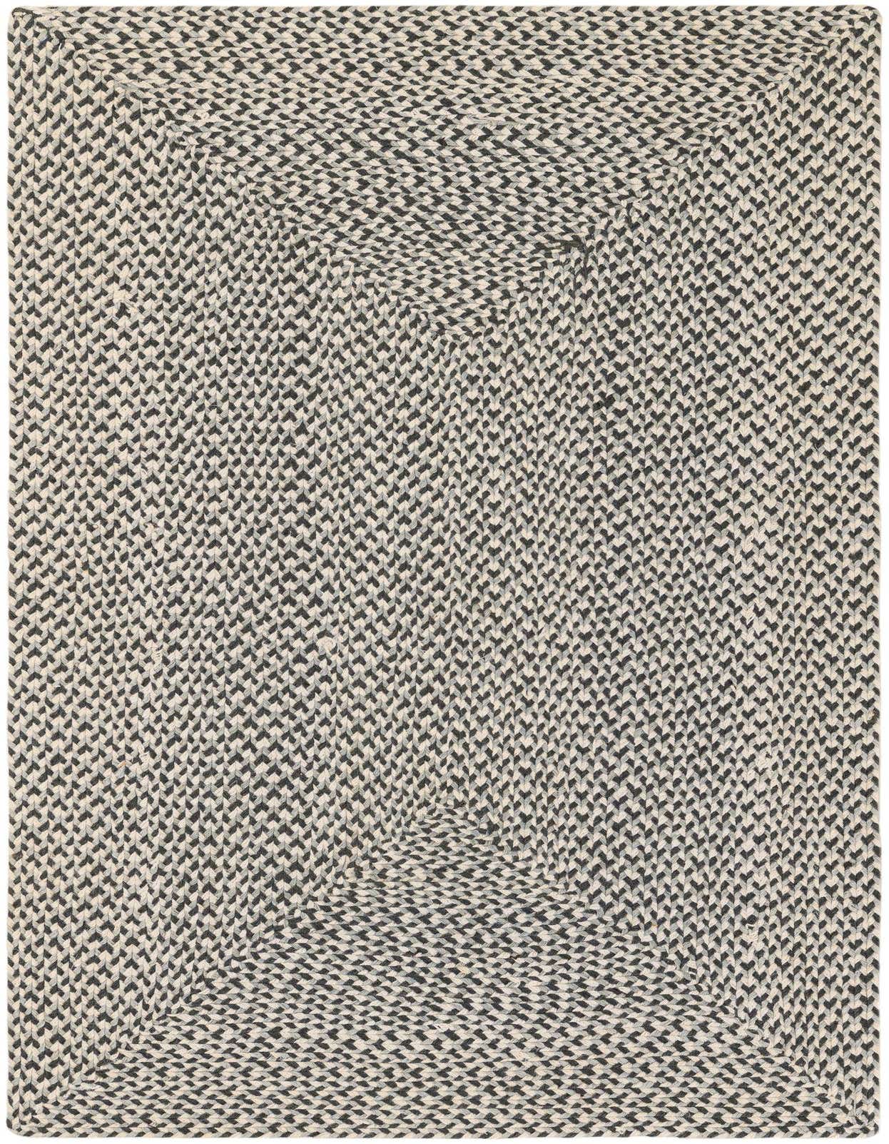 A 3x5 rectangular gray braided jute rug with a textured, medium pile, suitable for an entryway or kitchen.