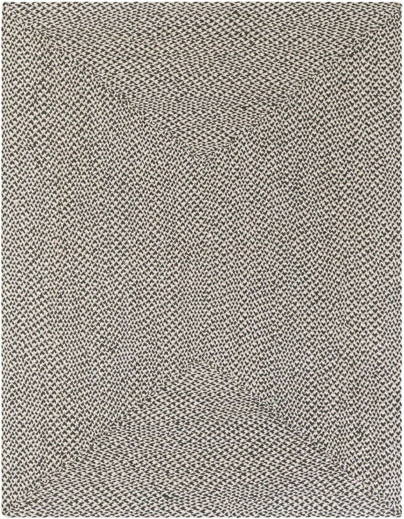 A 5x8 rectangular braided jute rug in shades of gray and silver, featuring a textured, durable weave.