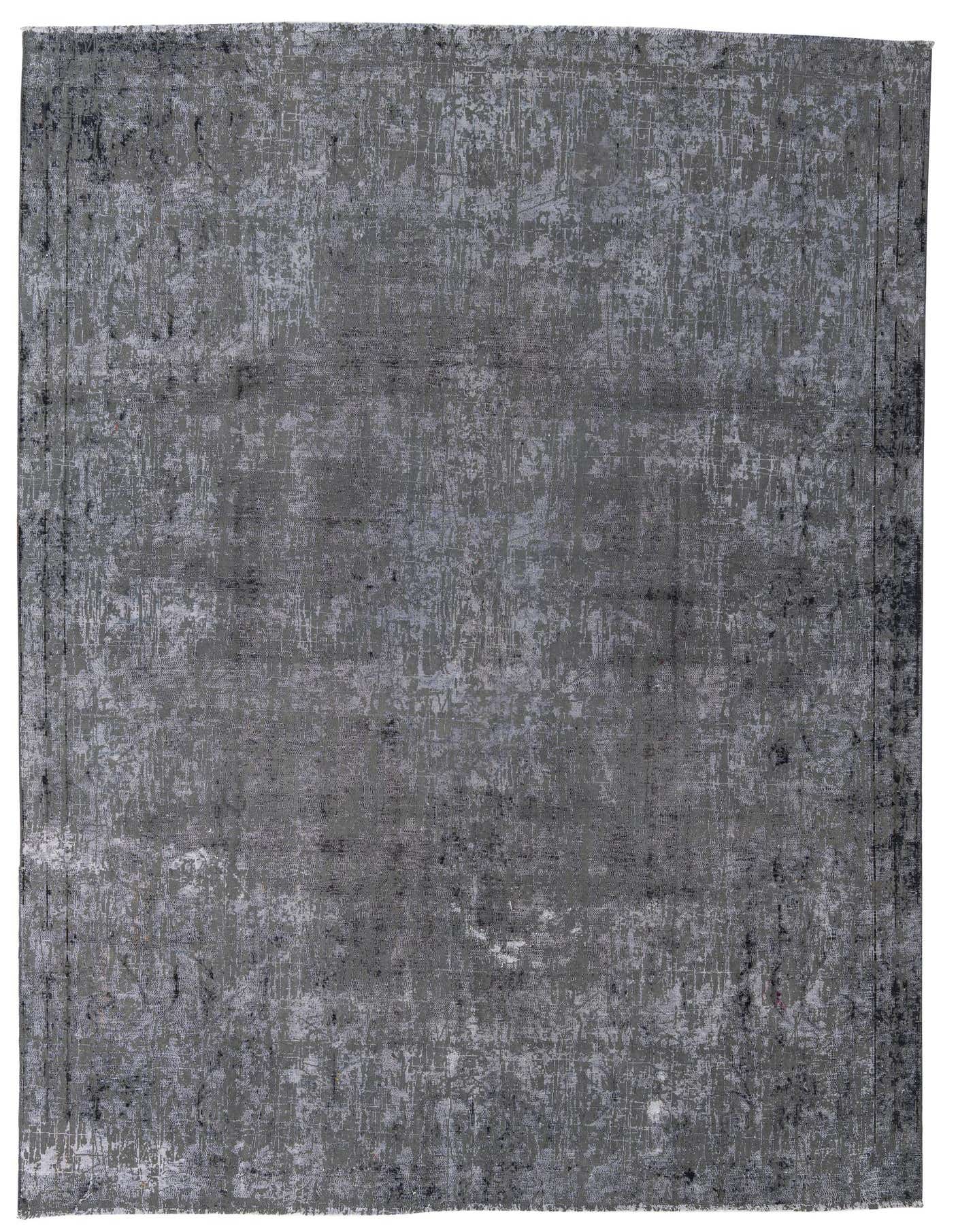A large 8x11 rectangular gray and silver wool rug with a distressed, abstract Persian-inspired pattern, ideal for a modern living room.
