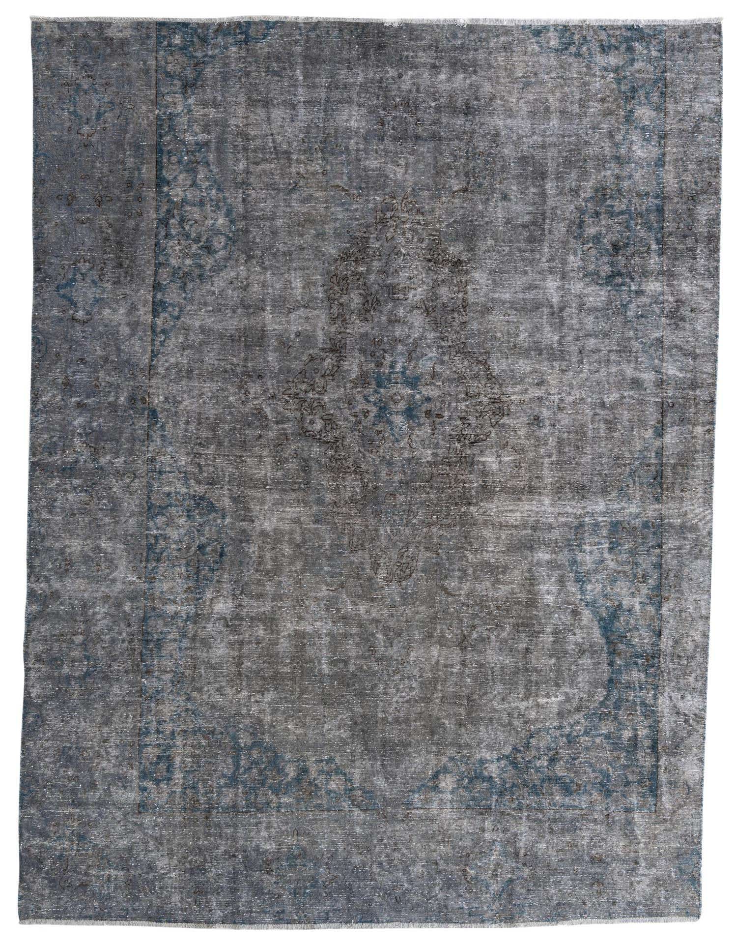 An 8x11 rectangular Ultra Vintage rug in shades of gray and silver with a faded blue Persian medallion pattern.