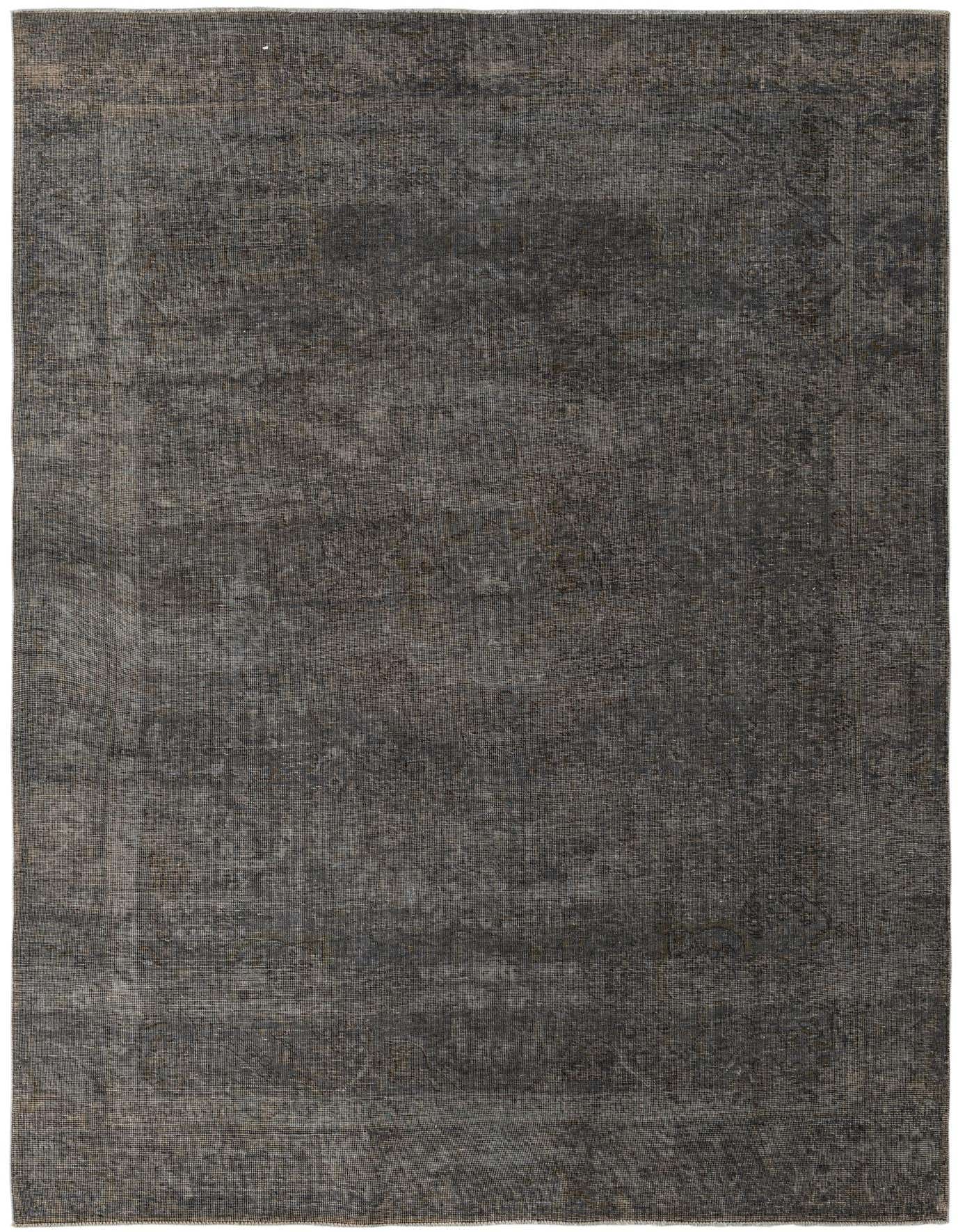 A 7x10 rectangular gray wool rug with a subtle, faded Persian medallion and border pattern, suitable for a living room.