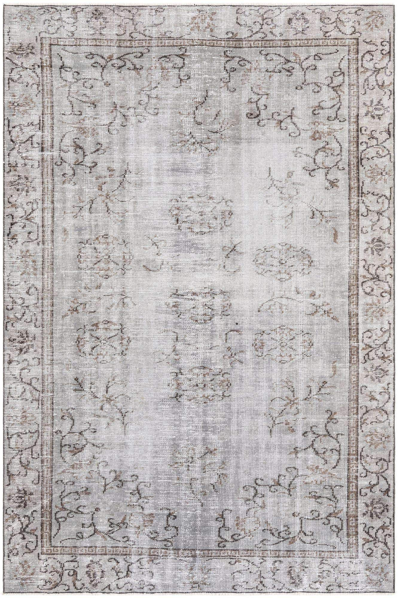 A 6x9 rectangular gray and silver modern vintage Persian rug with a faded floral and vine pattern, perfect for a living room.