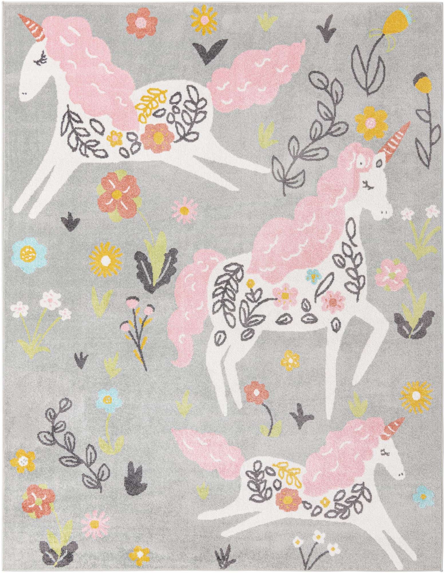 An 8x10 gray rectangular rug featuring three white unicorns with pink manes and tails, surrounded by colorful flowers and leaves.