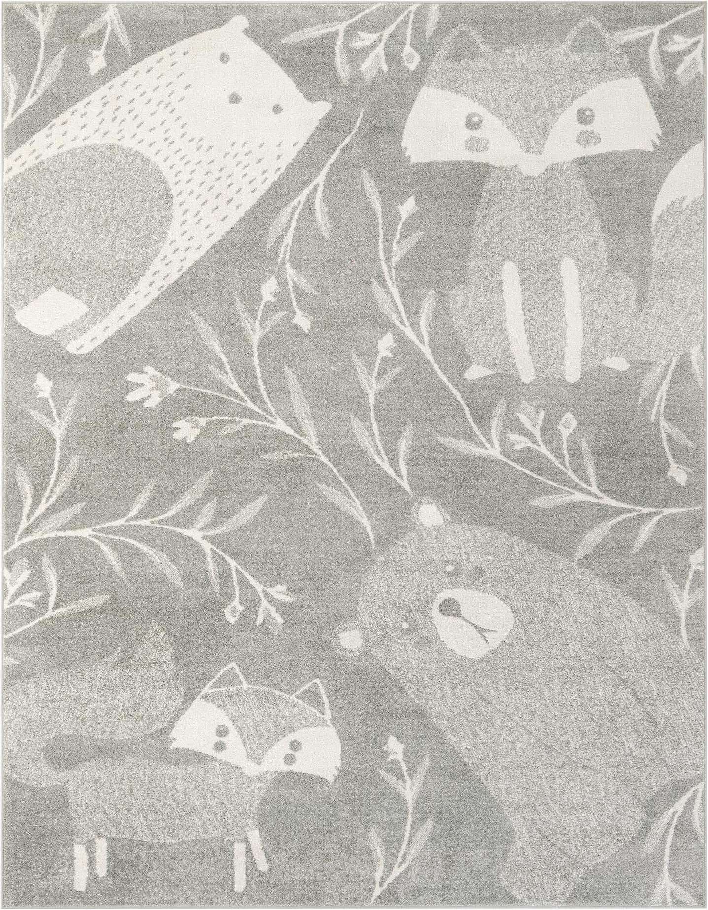 A gray 7x10 rectangular rug featuring a whimsical pattern of white bears, foxes, and delicate foliage.