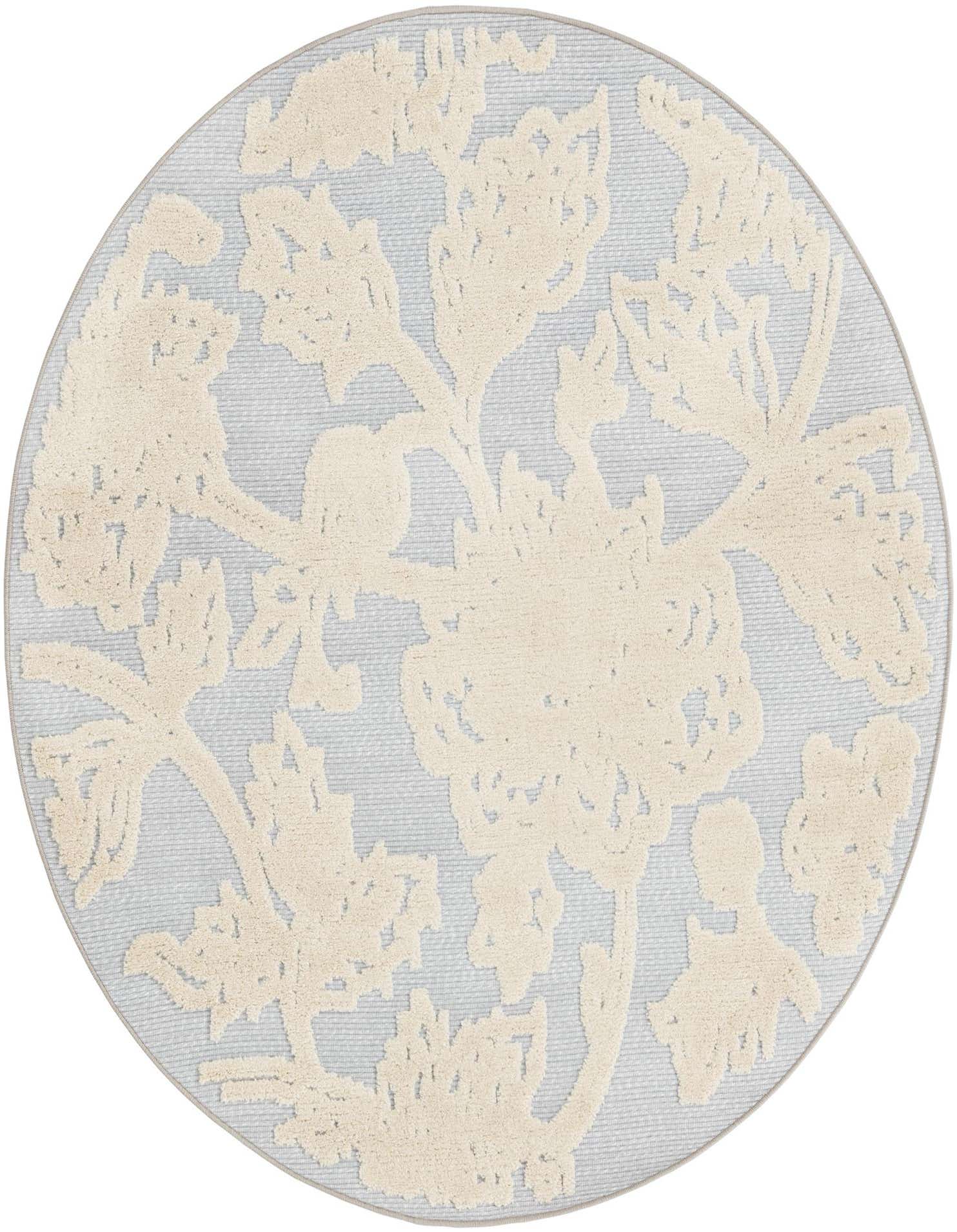 A 5' 3 round gray botanical rug with raised cream floral patterns, ideal for indoor or outdoor spaces.