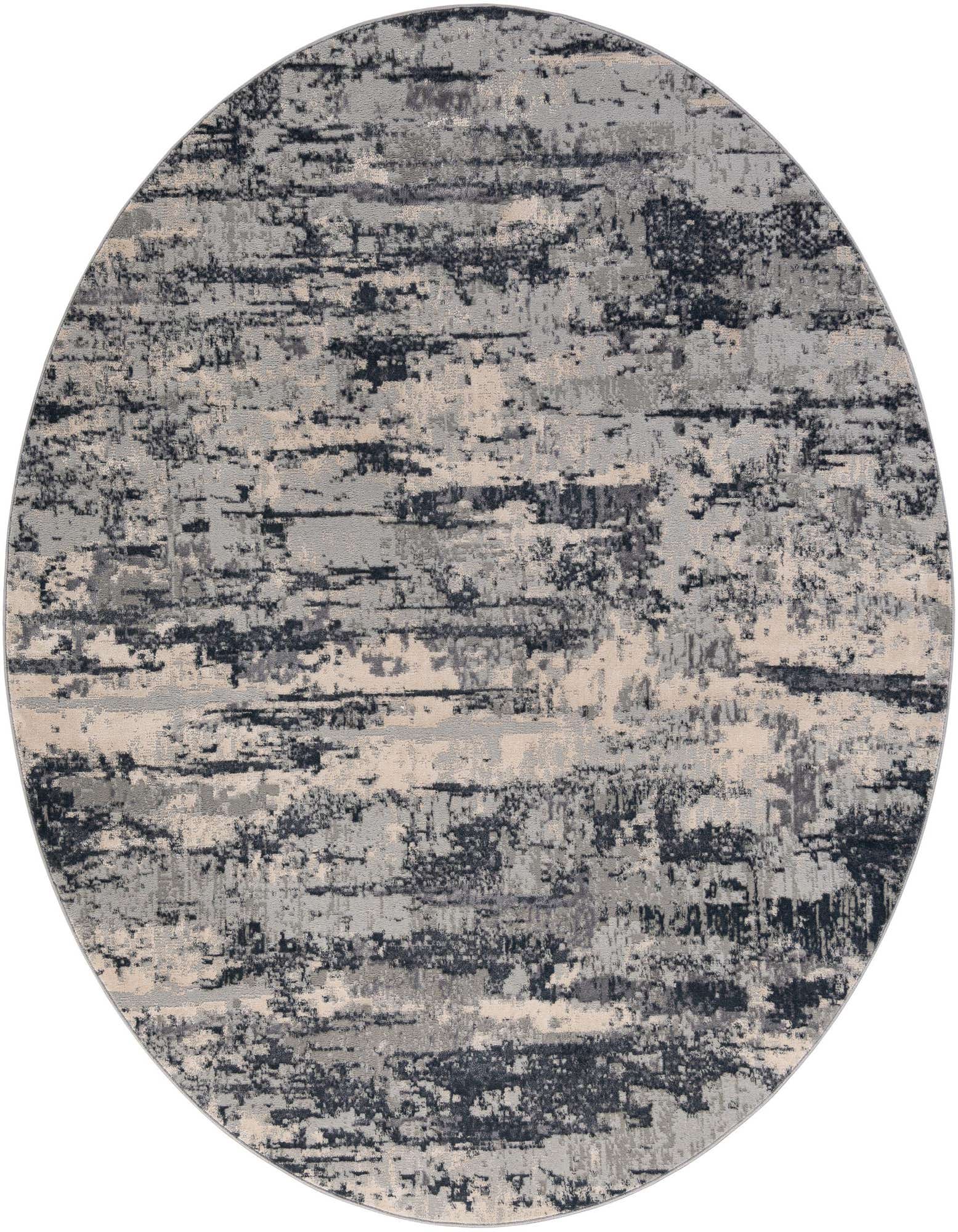 A 7' round gray and silver modern abstract rug with a textured pile and varying shades of gray, silver, and cream.