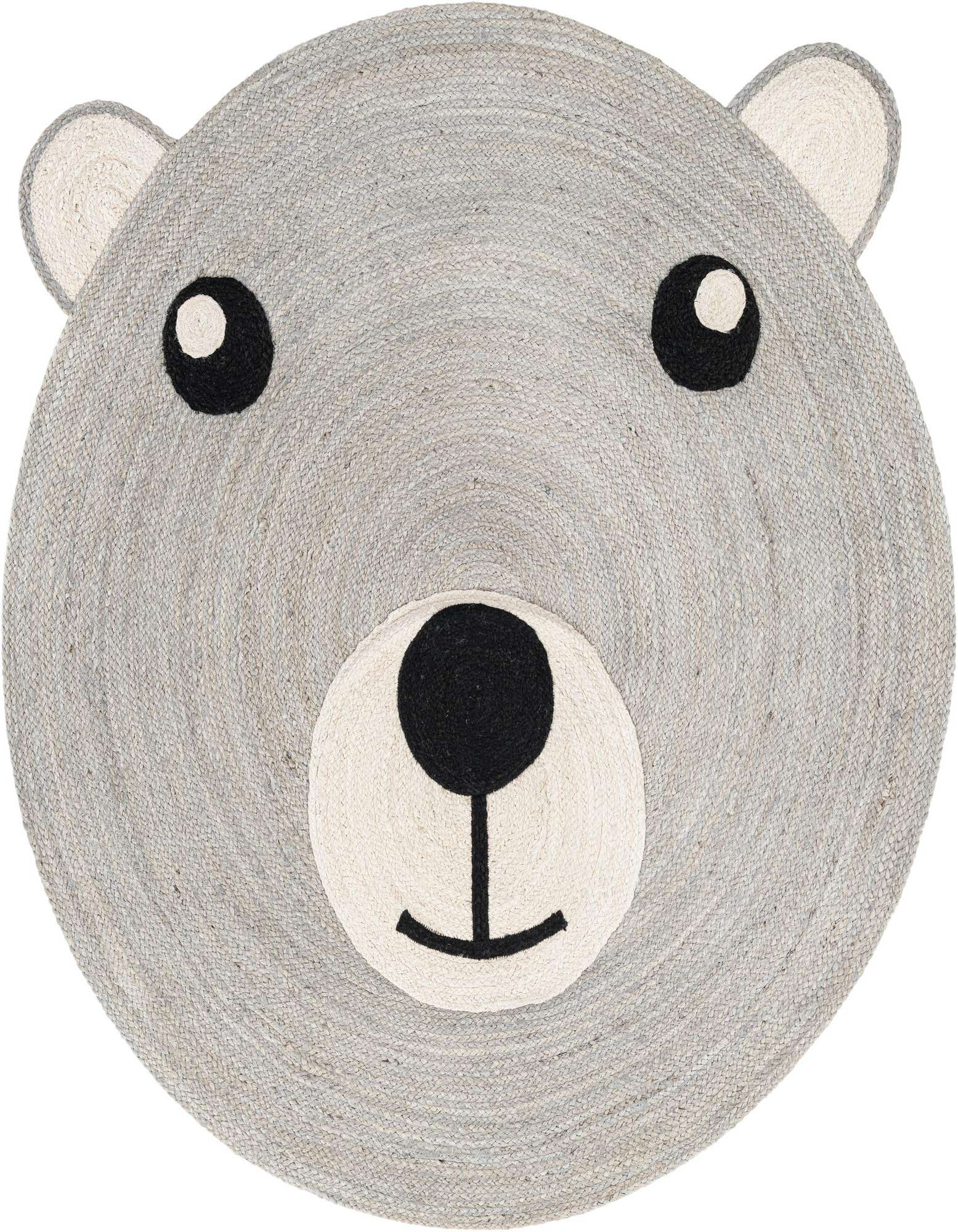 A round, gray jute rug shaped like a bear's head with black eyes and nose, and cream snout and inner ears.
