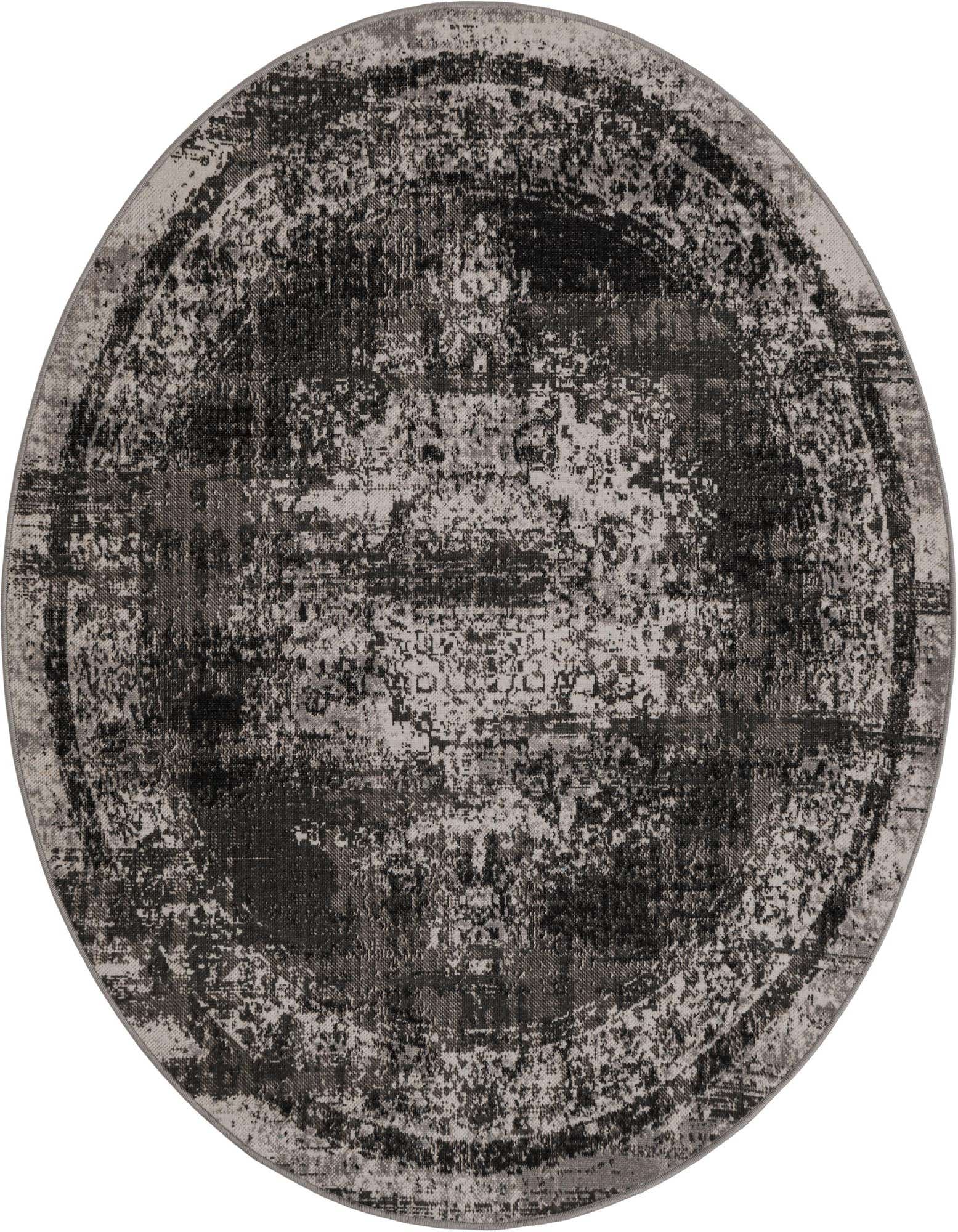 A 5' 3" round gray and silver bohemian rug with a distressed medallion pattern and textured pile.