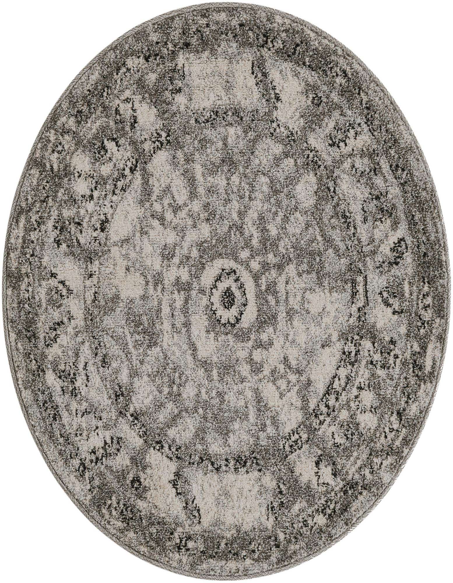 A 3' round gray and silver medallion rug with a distressed eclectic pattern, suitable for various indoor spaces.