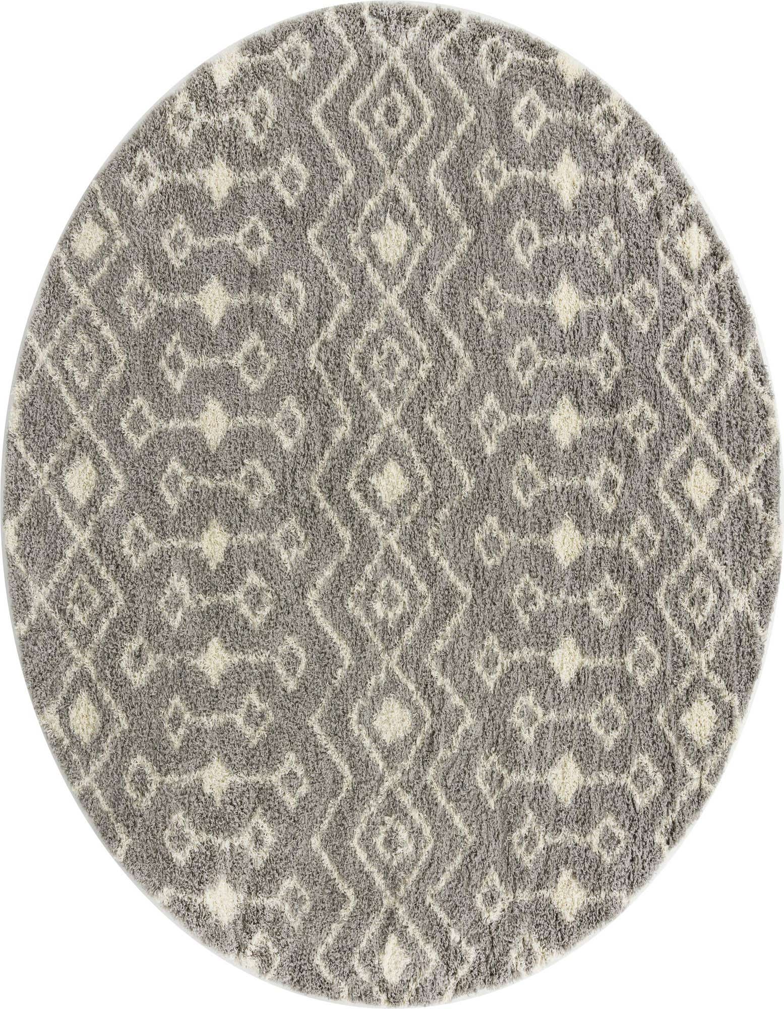 A 10-foot round gray shag rug with a cream tribal trellis pattern, perfect for a living room.