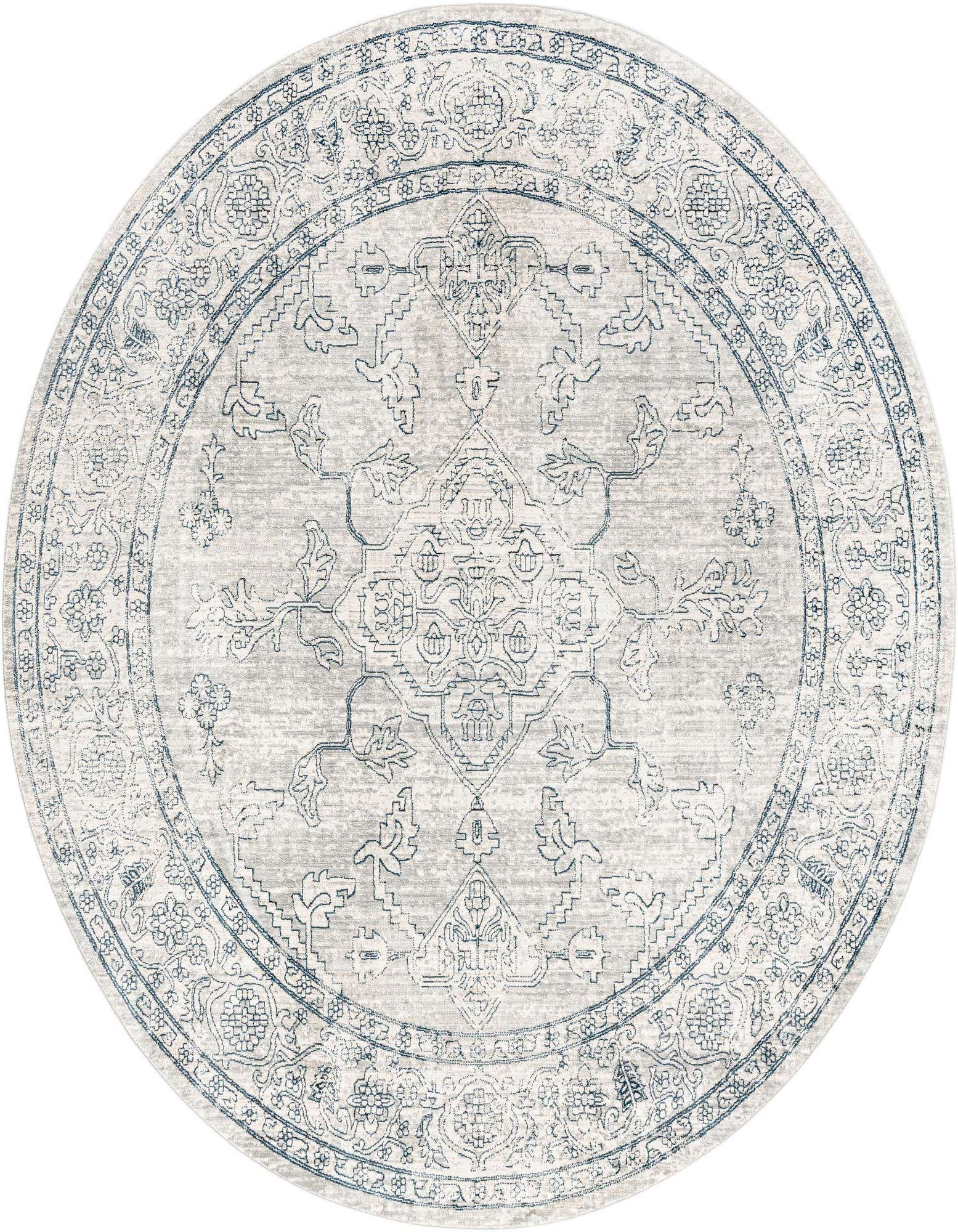 A 7' round gray polypropylene rug with a distressed traditional medallion and tribal border pattern in blue.