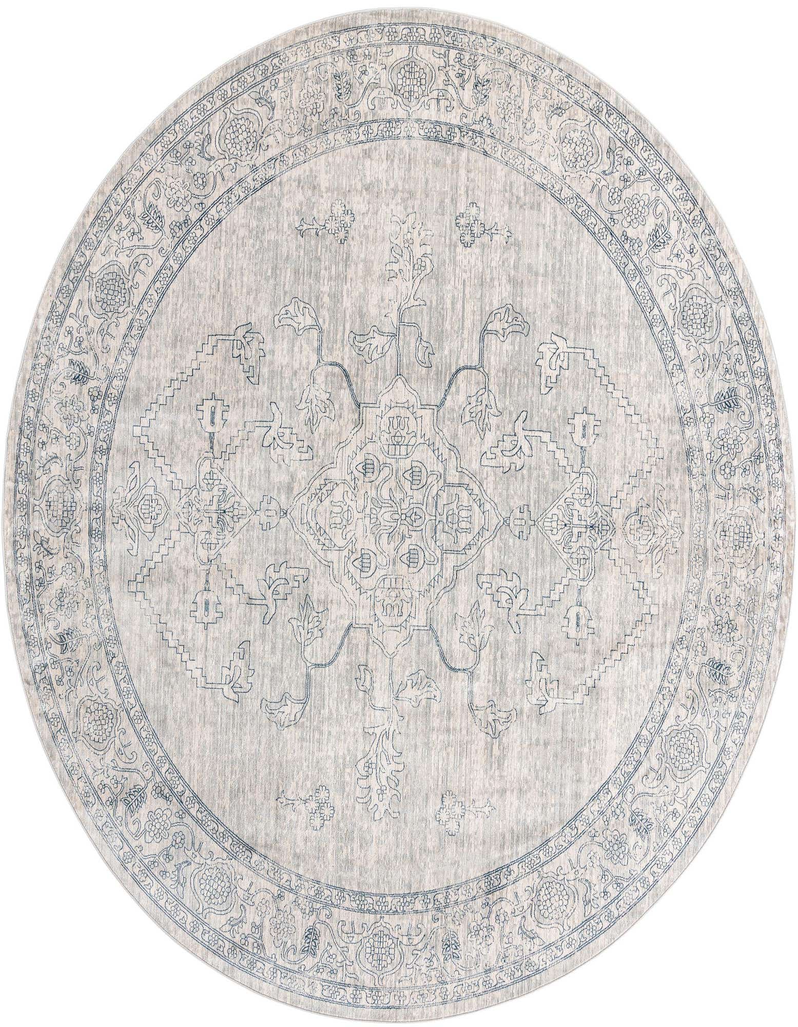 A 10' 2 x 10' 2 round gray area rug with a faded traditional medallion and tribal pattern, suitable for indoor spaces.