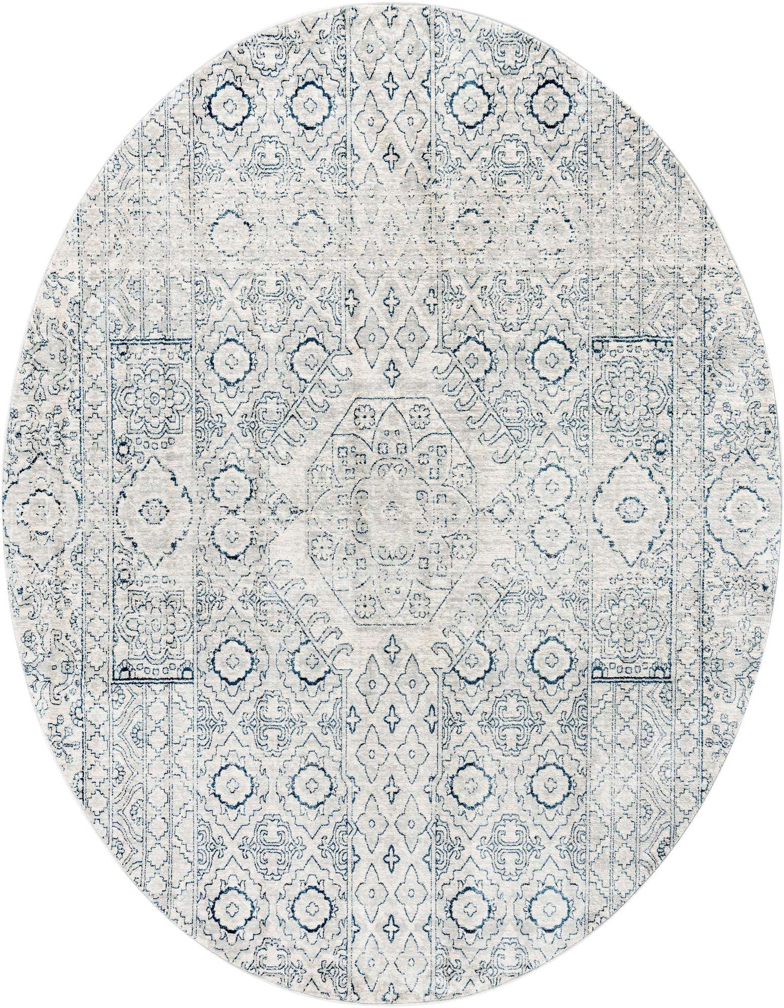 A 7' round gray and silver rug with a distressed traditional medallion and tribal pattern, suitable for an indoor living space.
