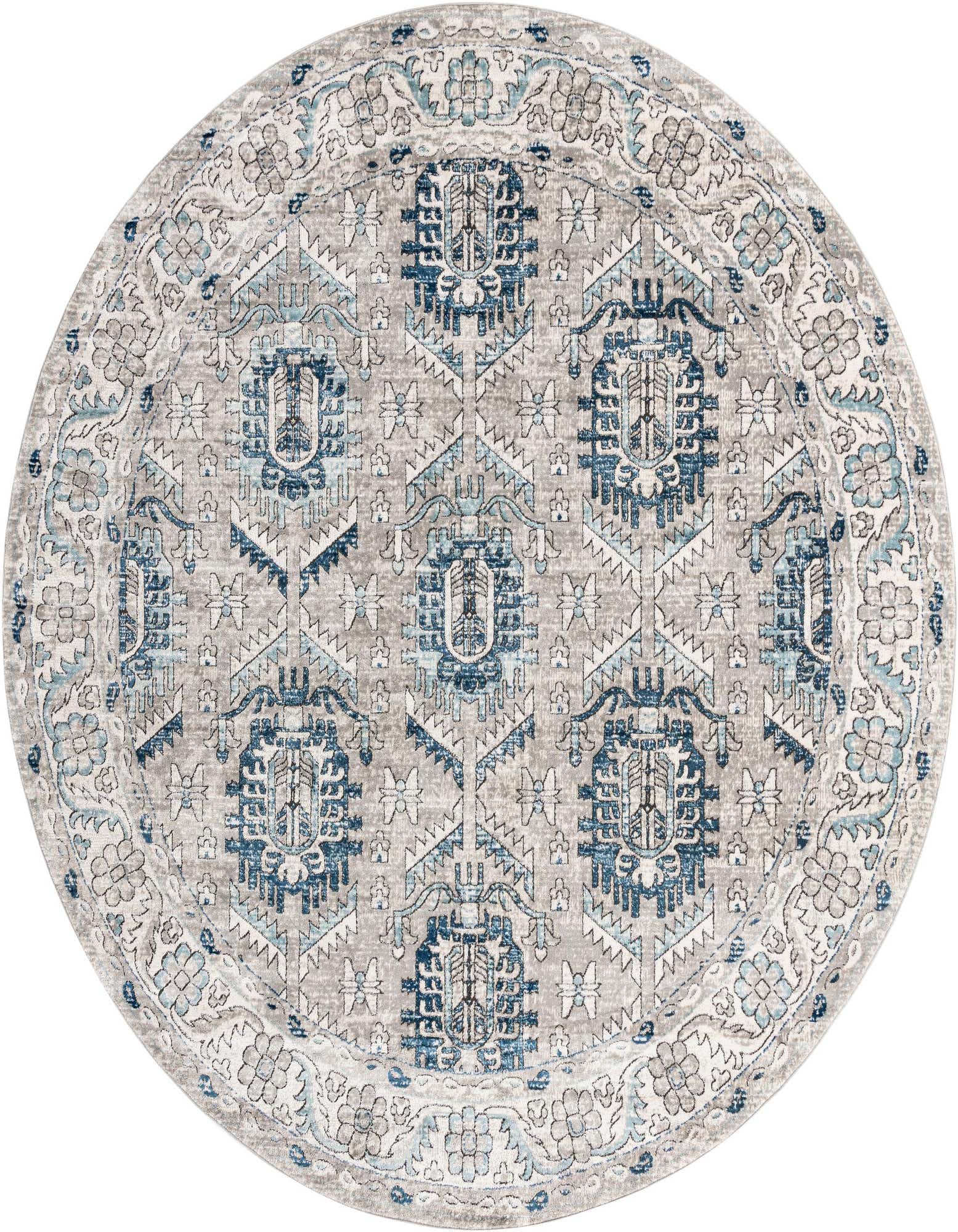 A 12' round gray area rug with a vintage medallion pattern in shades of blue and silver, featuring a textured high/low pile.