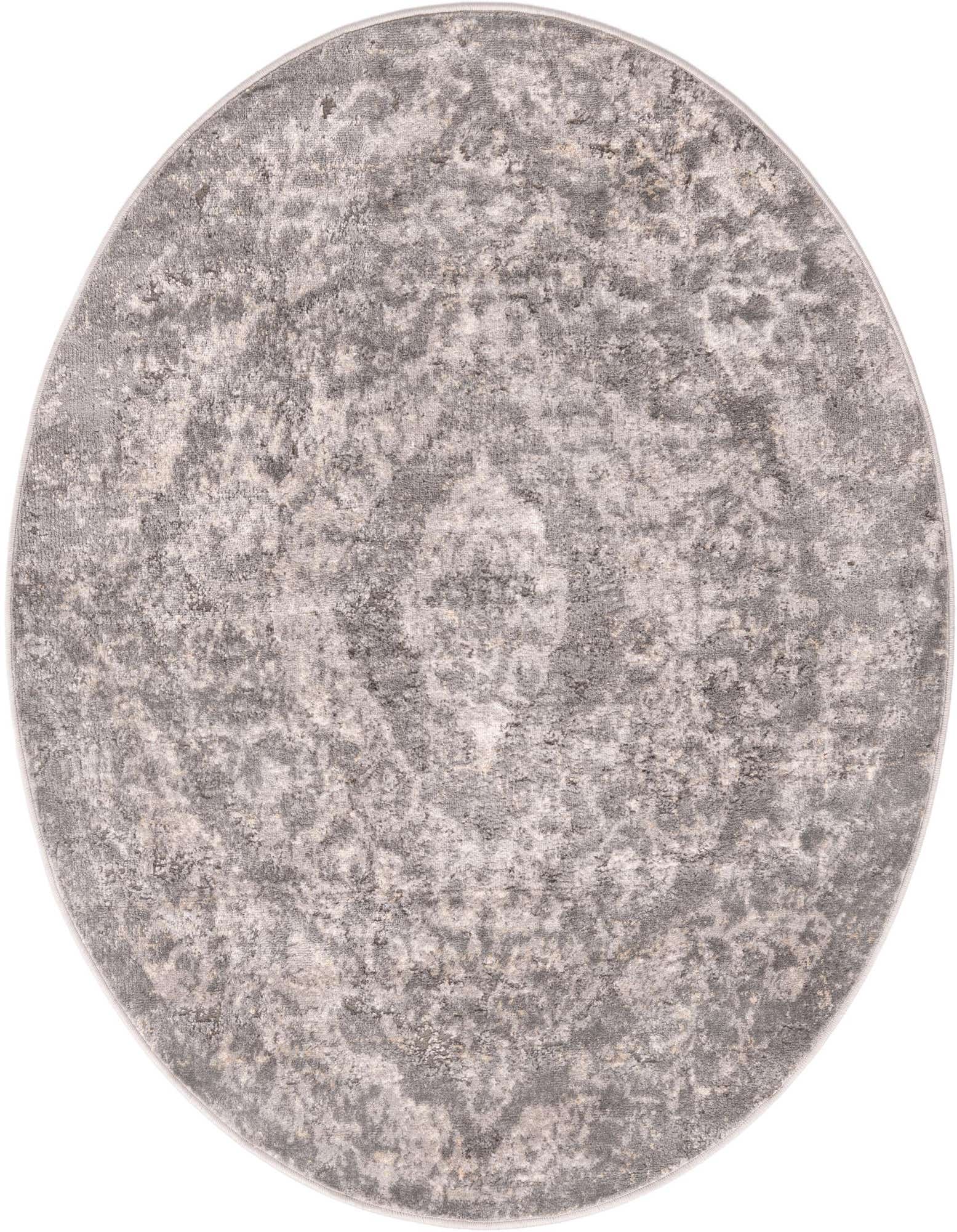 A 5' 3 round gray shabby-chic rug with a subtle medallion pattern, featuring a textured pile.