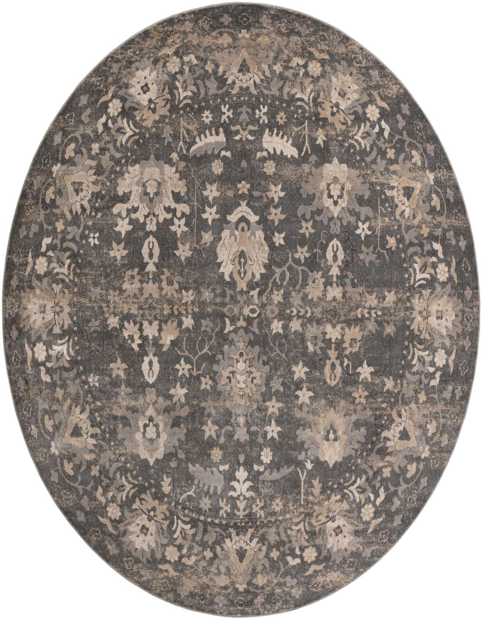 A large round gray and silver rug with an intricate, distressed traditional floral pattern, suitable for a living room or patio.
