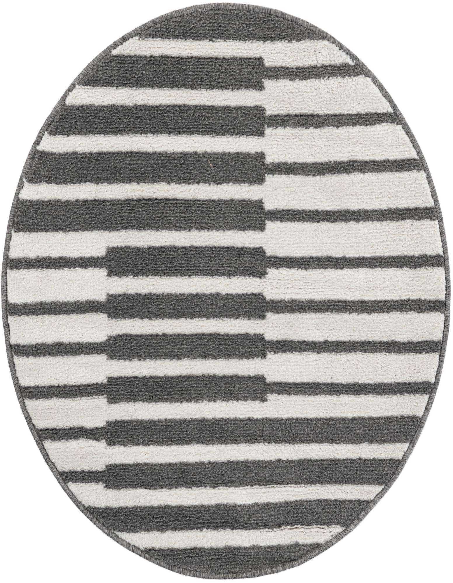 A round gray and white striped rug with a modern geometric pattern, suitable for various indoor spaces.