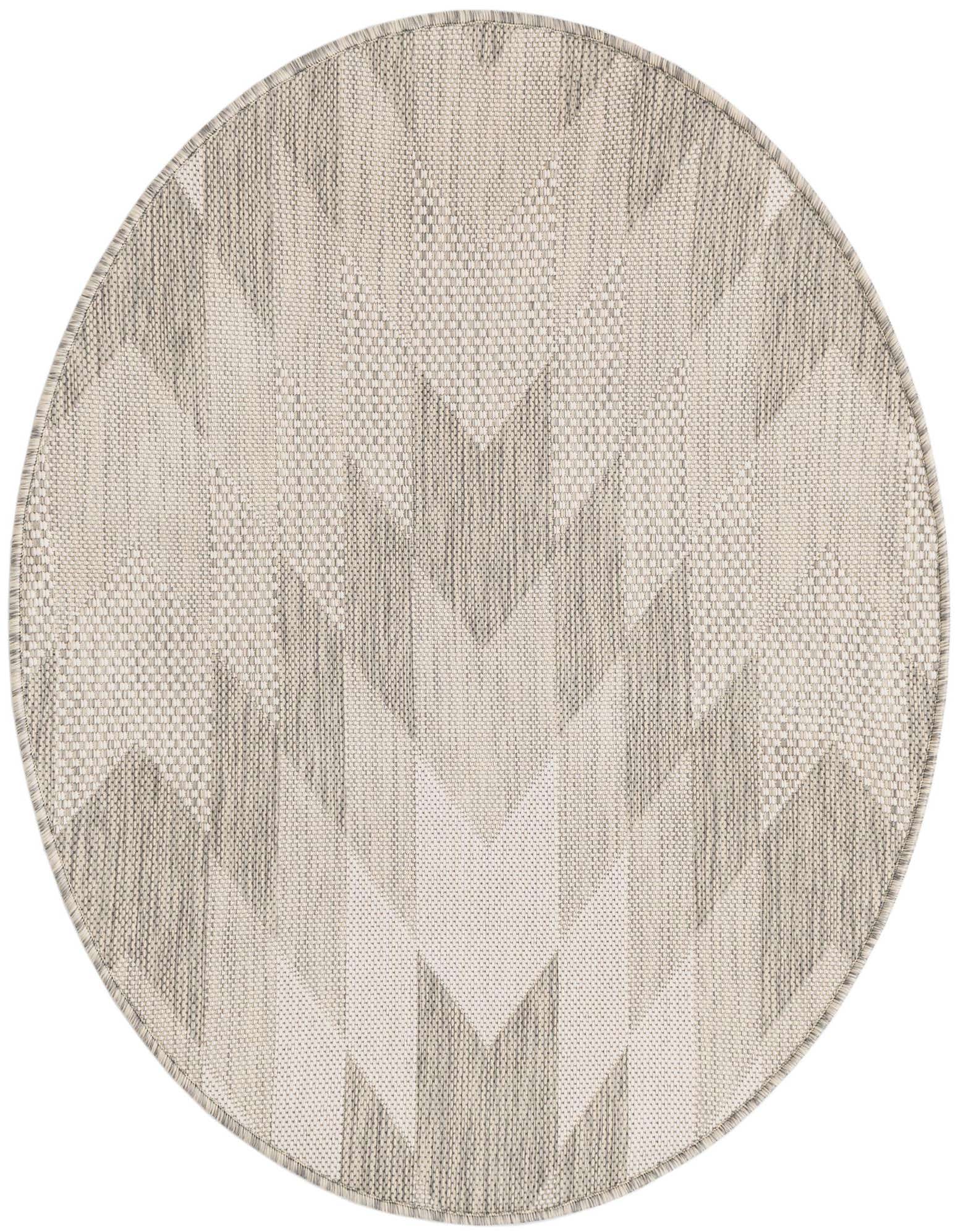 A round, 3' gray and silver polypropylene rug with a modern tribal chevron pattern, suitable for indoor or outdoor use.