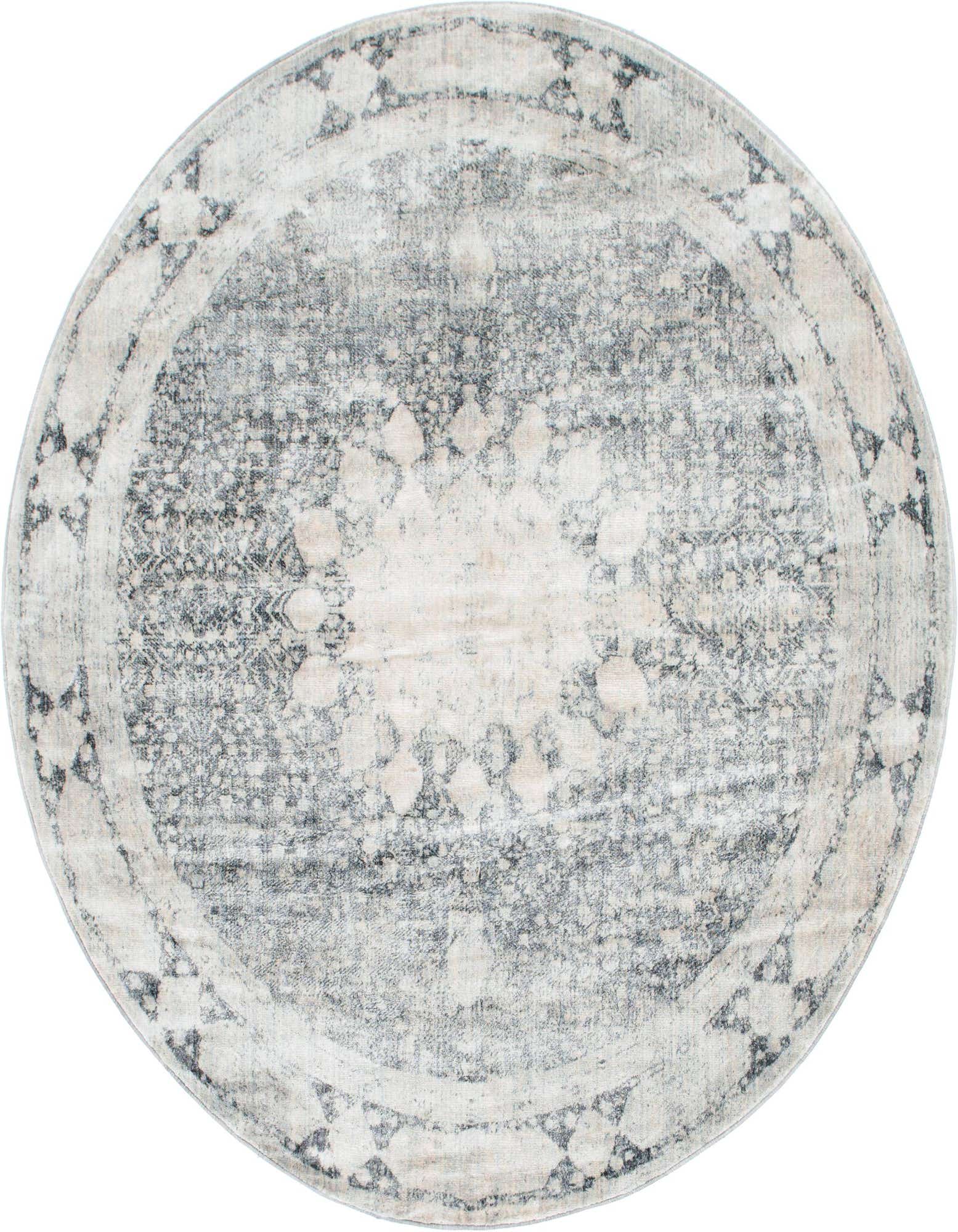 A round 8' gray and silver bohemian medallion rug with a distressed vintage look, suitable for indoor spaces.
