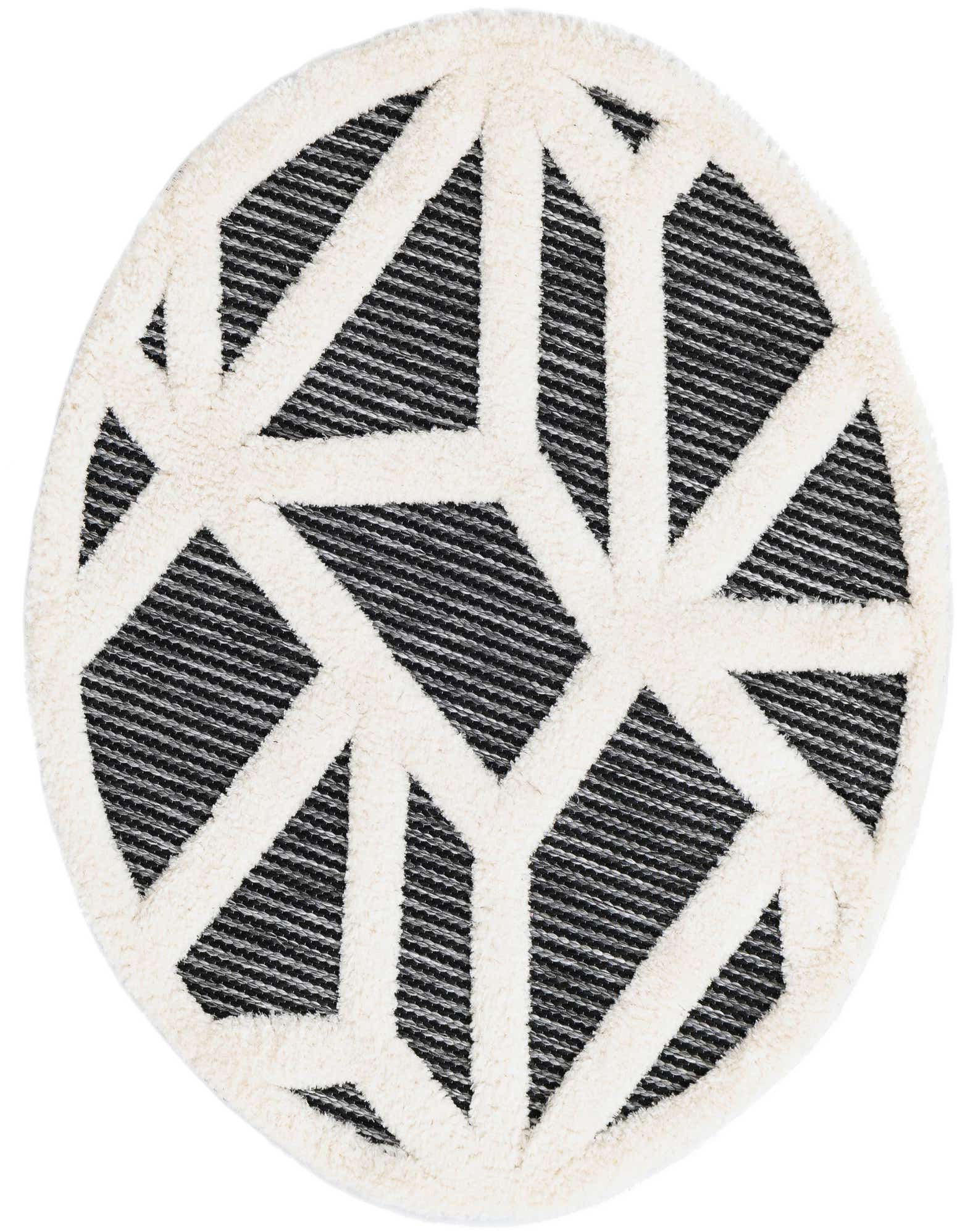 A 3' round gray and ivory rug with a bold geometric pattern, featuring a textured high pile.