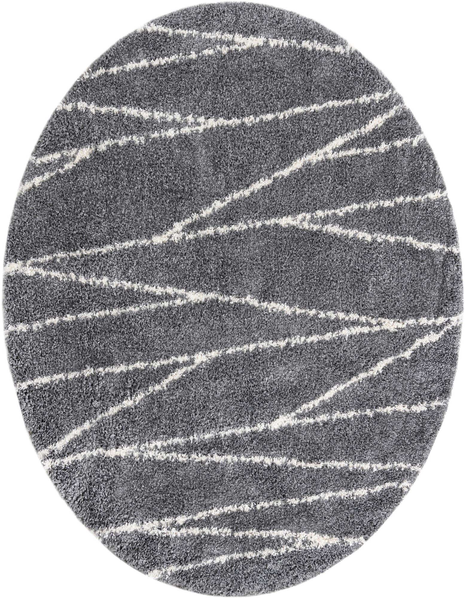 A 5' 3 round gray shag rug with an abstract white stripe pattern, suitable for modern indoor spaces.