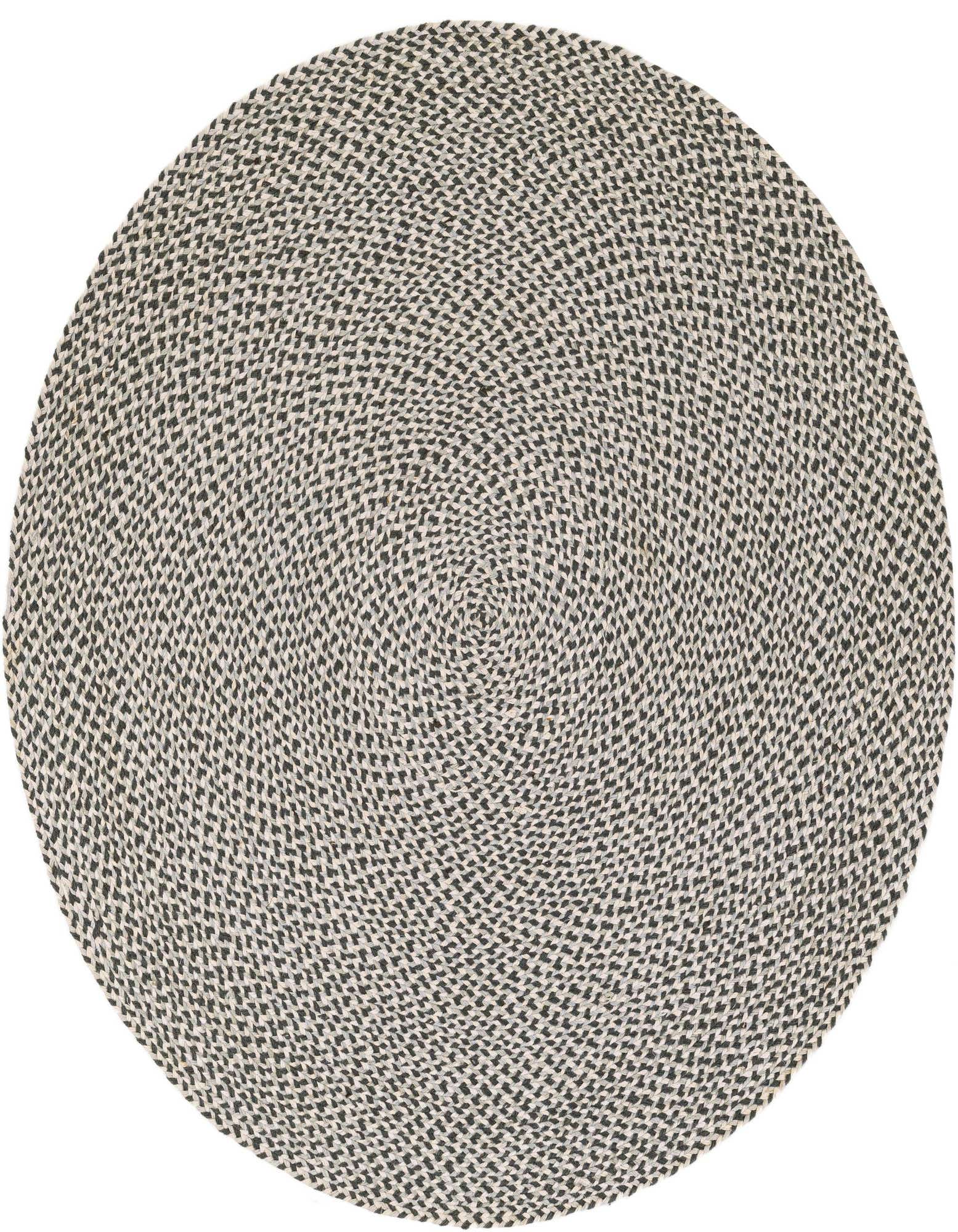 A 5' 1 round gray modern braided jute rug with a subtle speckled pattern, handmade for indoor spaces.
