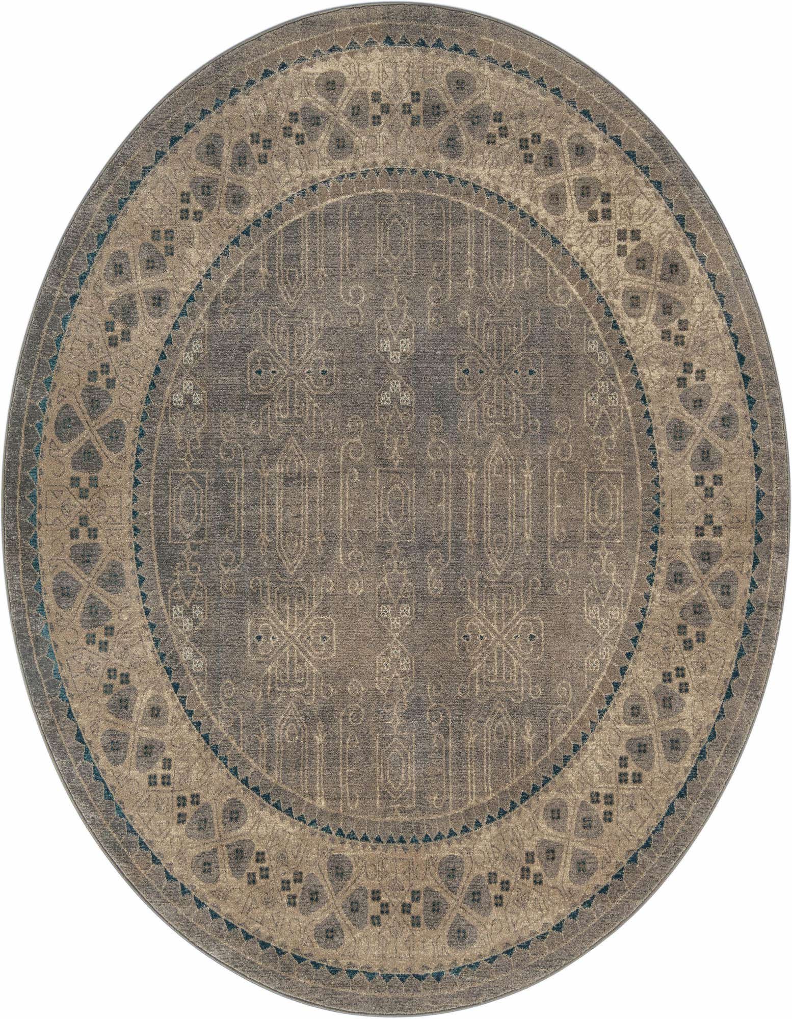 A 7' 3 round gray area rug with a detailed traditional and tribal pattern, featuring lighter gray and beige accents.