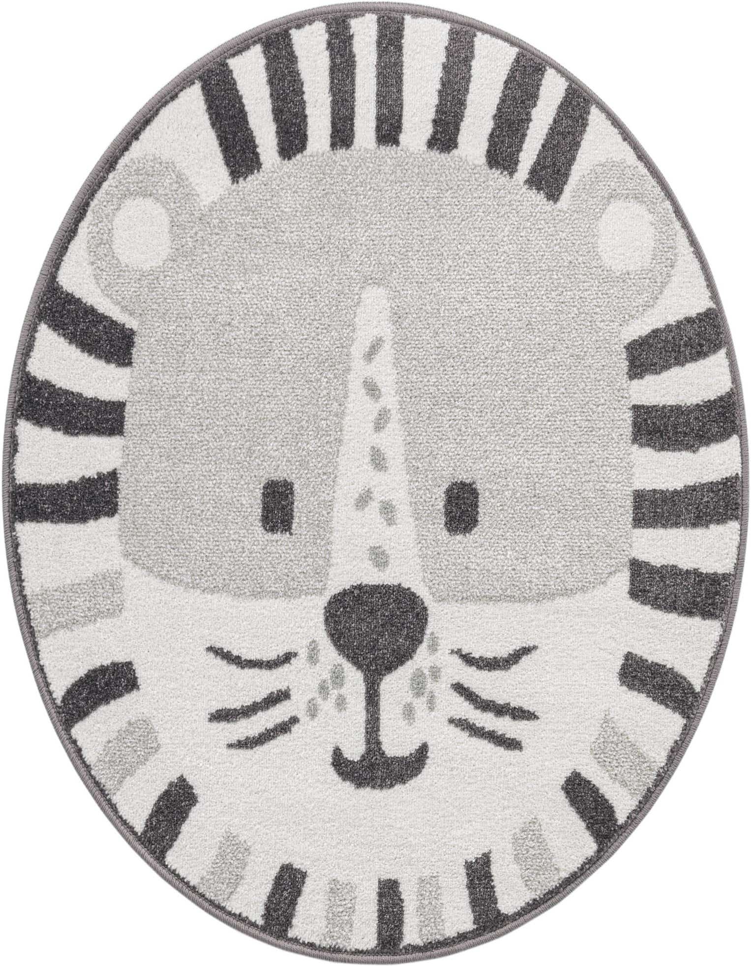 A round gray and white rug designed like a friendly cartoon lion's face, with dark gray stripes forming the mane.