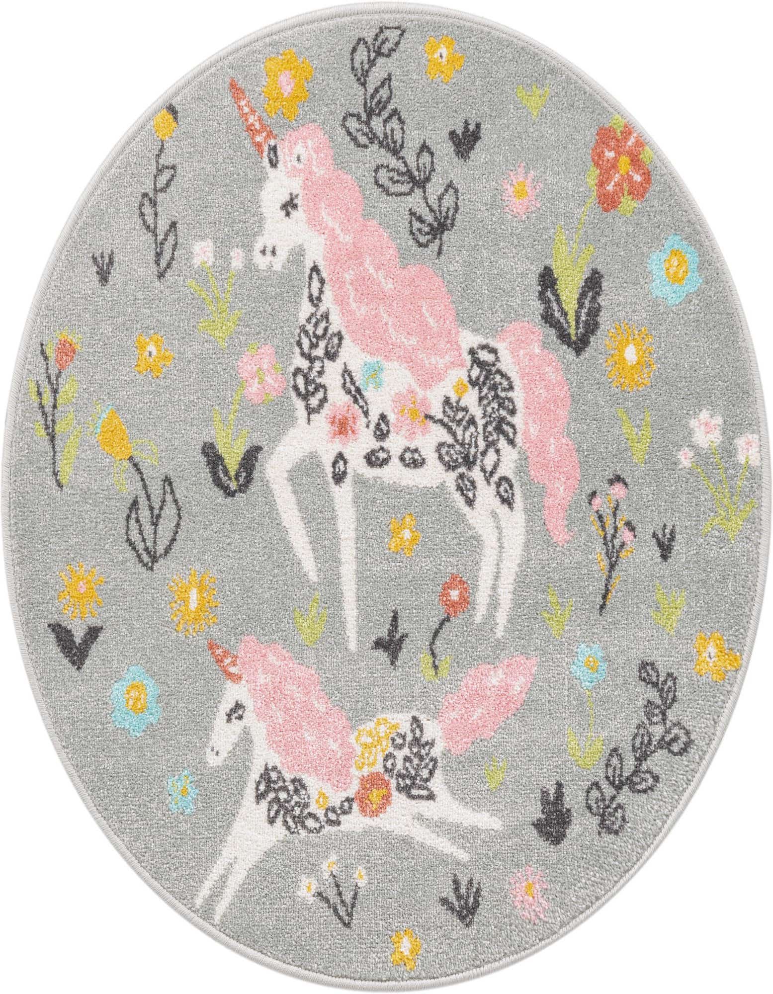 Round gray rug with two white unicorns featuring pink manes and tails, surrounded by colorful flowers and green leaves.