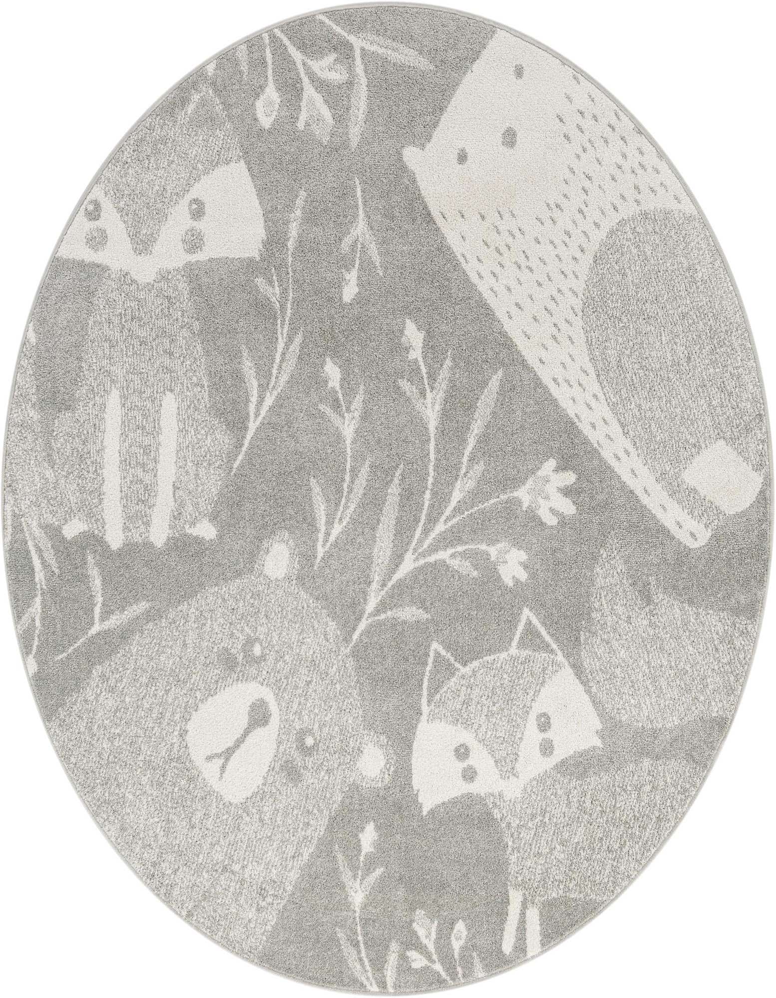 A round gray rug featuring a playful modern pattern of white woodland animals like bears, foxes, and hedgehogs with delicate foliage.