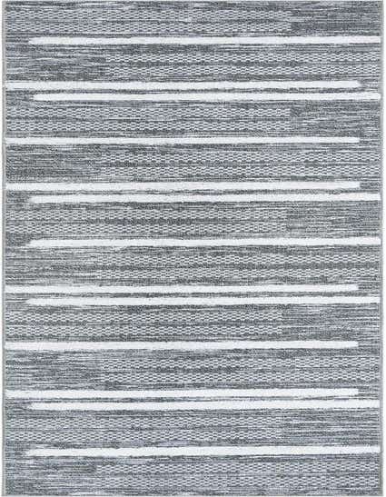 A 12 ft runner rug with a modern gray and white striped pattern, featuring textured high and low pile sections.