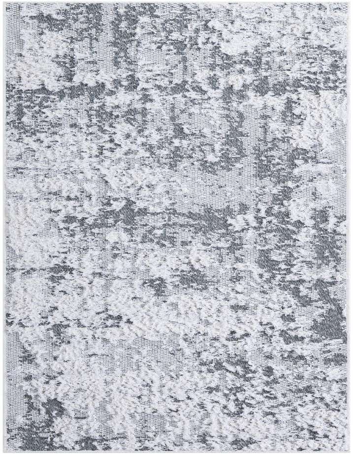 A gray and white abstract runner rug with a textured, high pile, perfect for a hallway or kitchen.