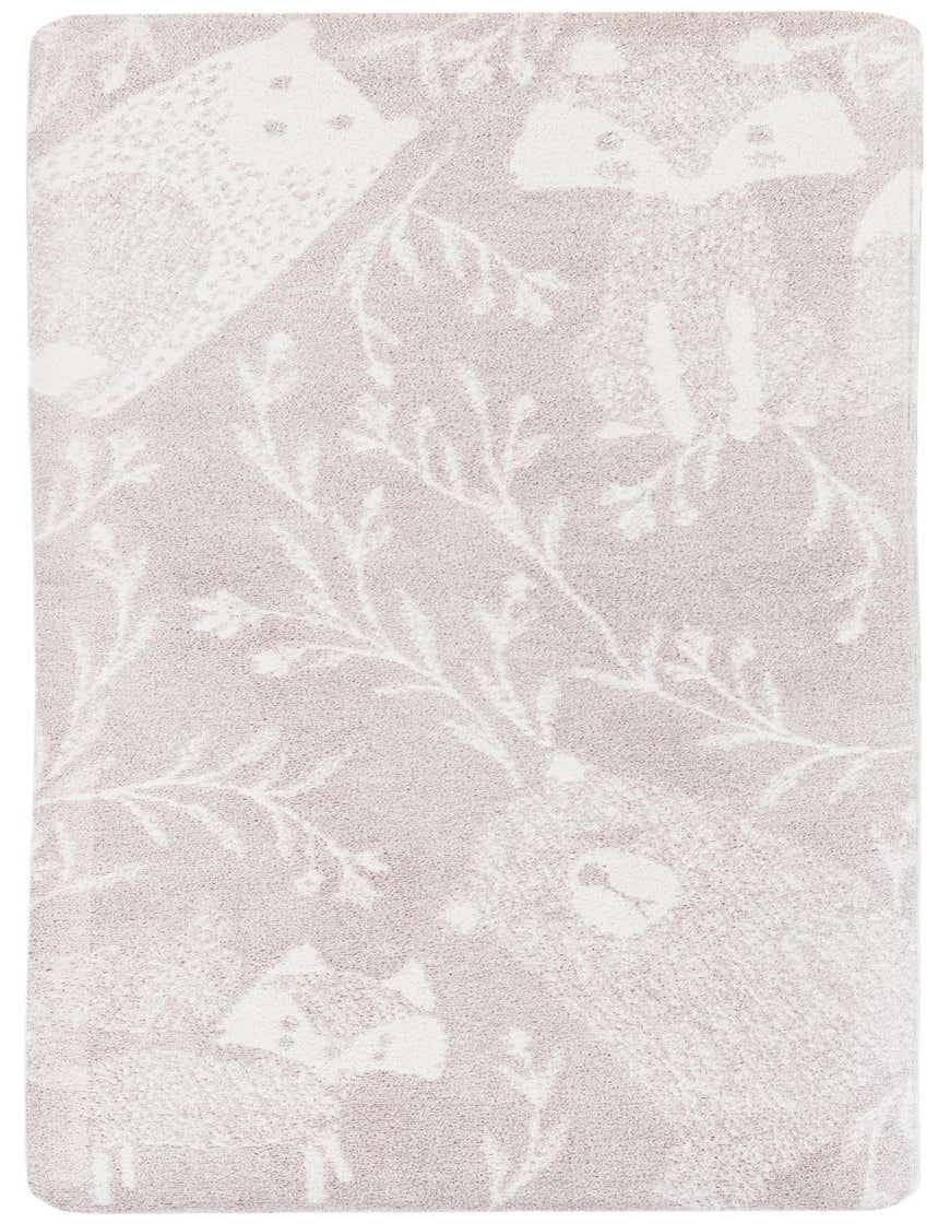 A soft gray runner rug with a modern pattern of white abstract branches and subtle animal shapes, ideal for a hallway.