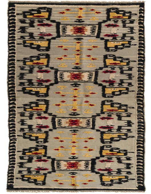 A 12 ft runner rug from the Darya Collection, featuring a modern geometric pattern in grays, silvers, yellow, red, and black.