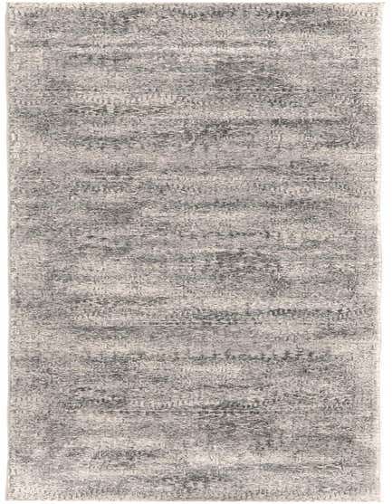 A 10 ft runner rug in shades of gray and silver with a modern, distressed solid pattern, ideal for a hallway.