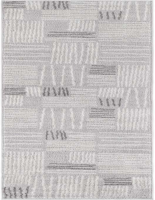 A gray 8 ft runner rug with a modern abstract pattern of light and dark gray stripes and blocks, perfect for a hallway.