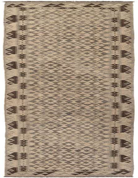 A 13 ft runner rug from the Kilim Maymana collection, featuring a tribal geometric pattern in shades of gray and silver, perfect for a hallway.
