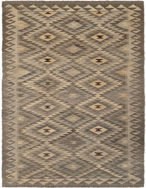 A 10 ft runner rug in gray and silver tones with a tribal geometric pattern, perfect for a hallway.