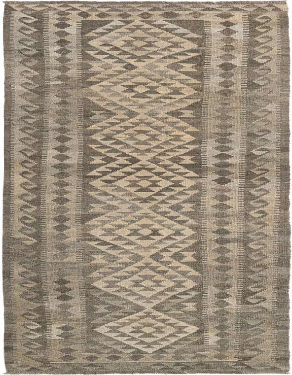 A 10 ft runner rug in shades of gray and silver, featuring a tribal geometric pattern, perfect for a hallway.
