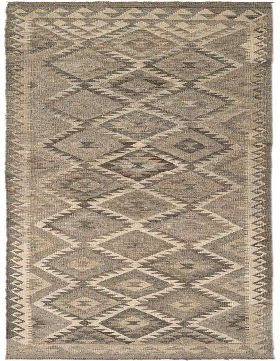 A 10 ft runner rug in shades of gray and silver with a tribal diamond pattern, ideal for a hallway.